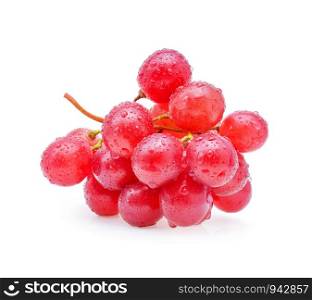 red grapes and water drops isolated on white background