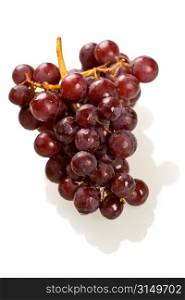 Red grapes on white