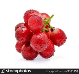 Red grapes with drop of water isolated on white background.