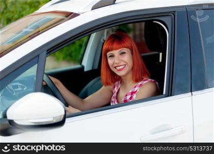 Red haired woman premiering her new car