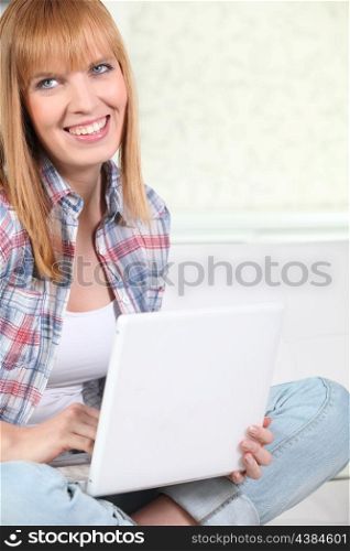 Red-haired woman with computer