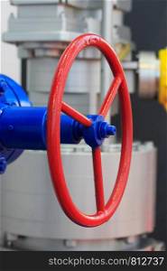 Red handwheel of the industrial steel gate valve.