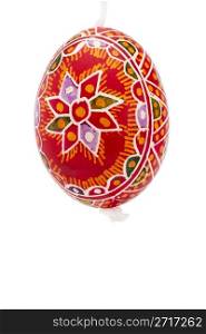 red hanging hand painted easter egg. red hanging hand painted easter egg on white background
