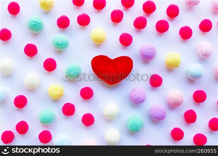 Red heart, little colorful balls . Concept of Valentines Day on white background