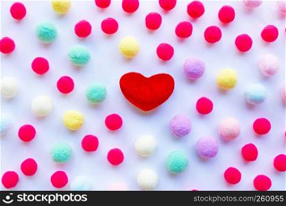Red heart, little colorful balls . Concept of Valentines Day on white background