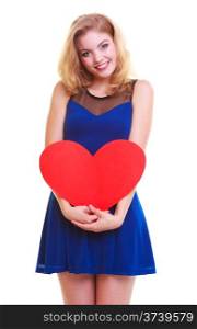 Red heart. Love symbol. Portrait beautiful woman hold Valentine day symbol. Cute blonde girl in blue dress expressing tender feelings. Isolated studio shot