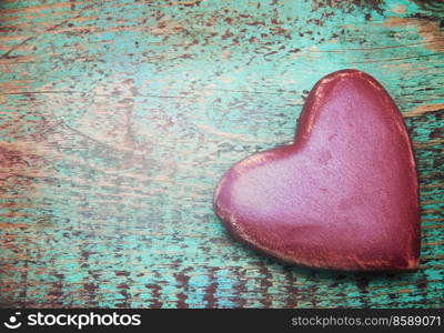 red heart on a wooden background