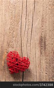 red heart over wooden background for Valentines