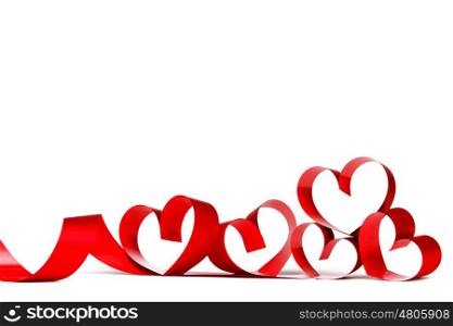 Red heart ribbon bow isolated on white background