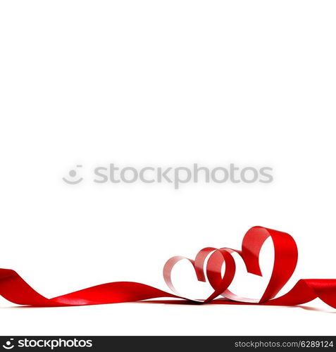 Red heart ribbon bow isolated on white background