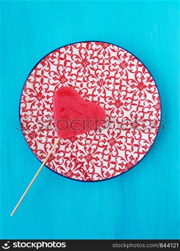 red heart shape lollipop candy