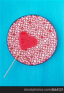 red heart shape lollipop candy