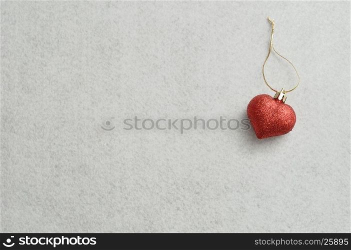 Red heart to decorate a christmas tree