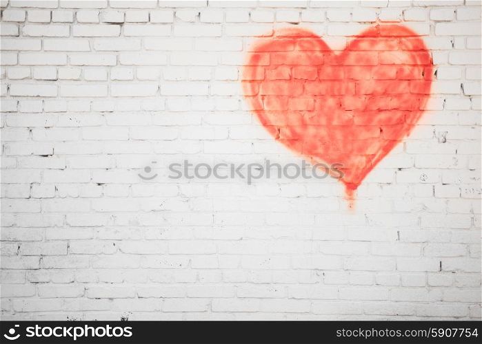 red heart. white brick wall with red heart background