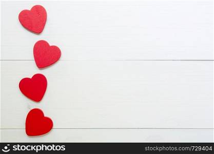 Red Heart with love on wooden background, 14 February Valentine day on grunge white wood, celebration and holiday concept, top view, copy space.