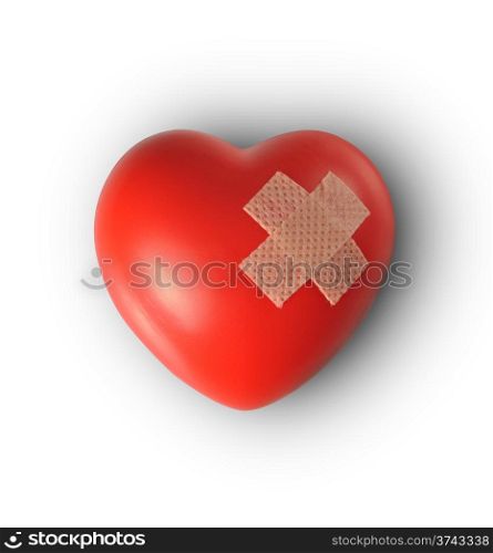 Red heart with plaster, Isolated on white background