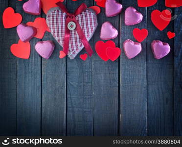 red hearts and chocolate candy on a table