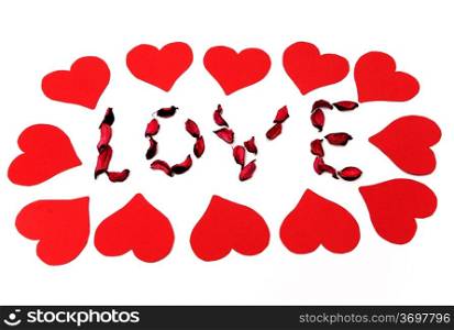 red hearts and petals on white background