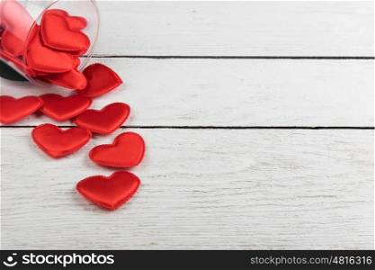 Red hearts on a white wood background, for valentines day illustration