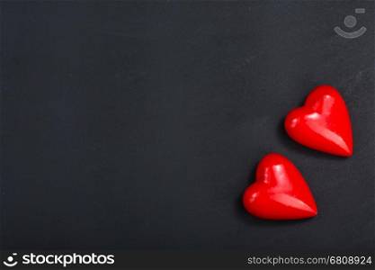 red hearts on the black table