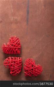 red hearts over wooden background for Valentines