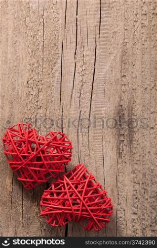 red hearts over wooden background for Valentines day