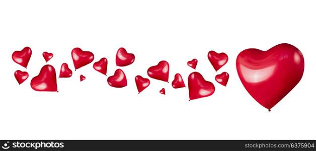 Red hearts shaped balloons on white background, isolated. Love or Valentines day concept