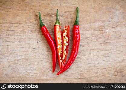 red hot chili peppers on the wooden background