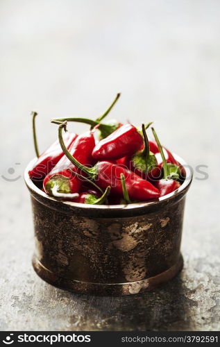 Red Hot Chili Peppers over wooden background