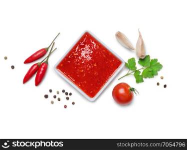red hot chilli sauce isolated on a white background.Top view