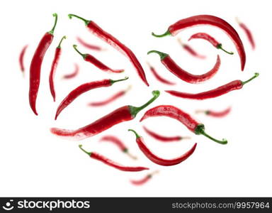 Red hot pepper in the shape of a heart on a white background.. Red hot pepper in the shape of a heart on a white background