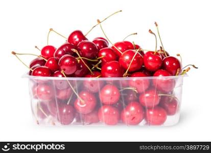 Red juicy sweet cherries in a plastic tray isolated on white background