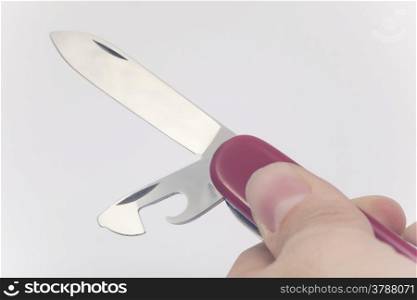 Red knife isolated on white background