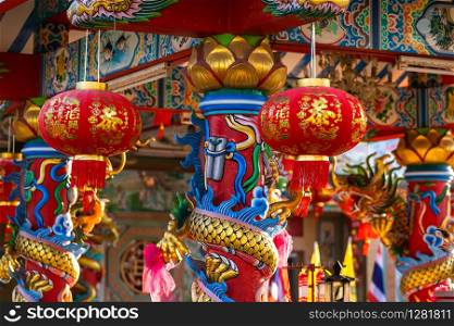red lantern decoration for Chinese New Year Festival at Chinese shrine Ancient chinese art with the Chinese alphabet Blessings written on it Is a Fortune blessing compliment,Is a public place Thailand