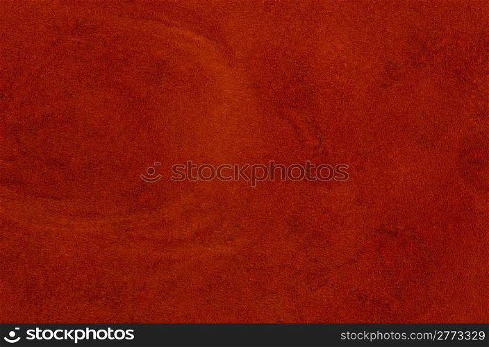 Red leather texture closeup detailed background.