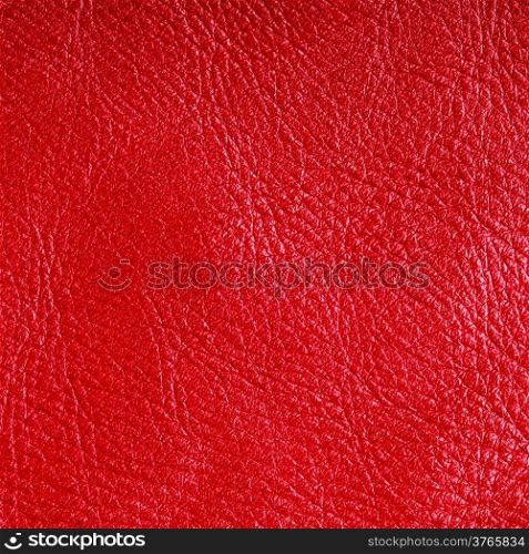Red leather texture closeup grunge background. Country western background, cowboy rawhide design, abstract pattern. Square format