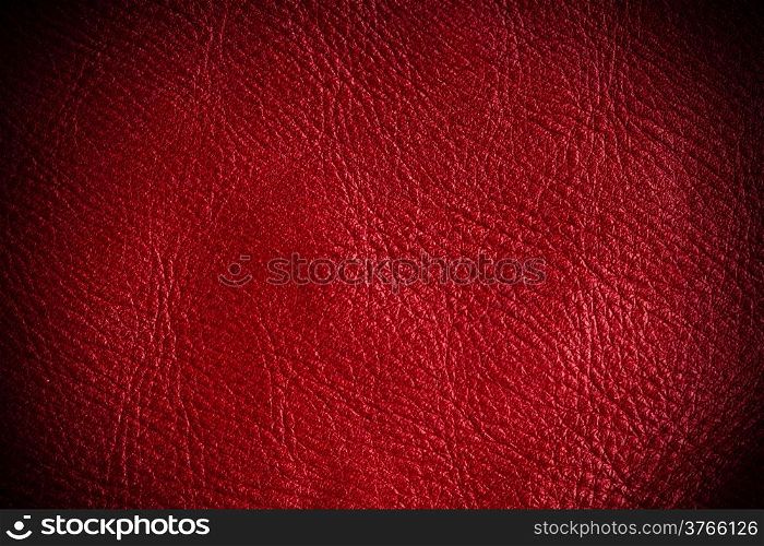 Red leather texture closeup grunge background. Country western background, cowboy rawhide design, abstract pattern