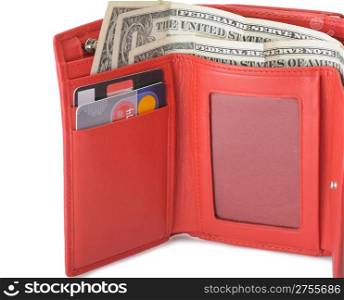 Red leather wallet with dollars and credit cards. It is isolated on a white background