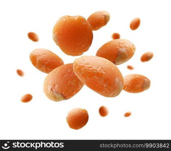 Red lentils levitate on a white background.. Red lentils levitate on a white background