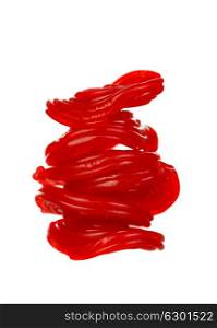 Red licorice candy spirals isolated on white background