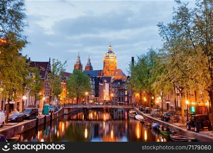 Red Light District in Amsterdam at dusk in Netherlands, North Holland province.