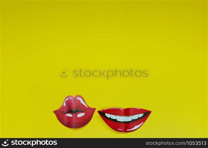 red lips depicting various emotions on a yellow background copy space, abstract background.. red lips depicting various emotions on a yellow background copy space, abstract background