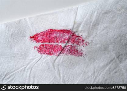 red lipstick on tissue