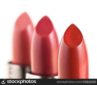 Red lipstics isolated on white