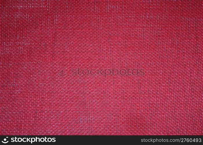 Red loosely woven fabric to be used as a background