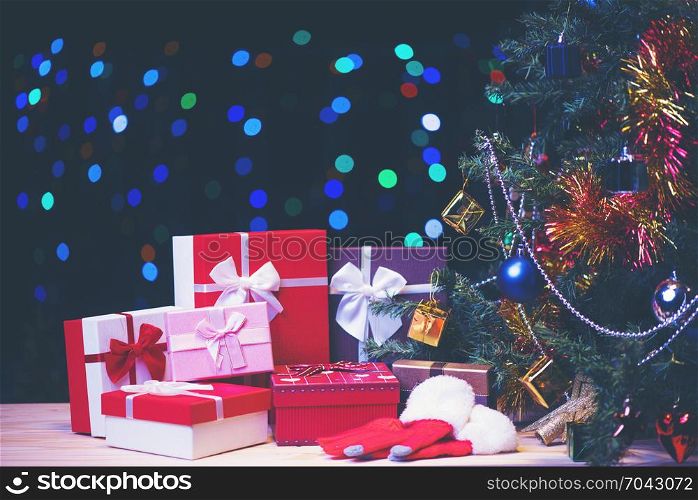 Red luxury New Year gift. Christmas gift. Happy New Year 2018. Christmas background with gift box. Christmastime celebration.