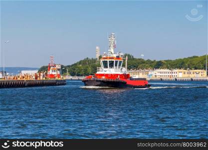 Red marine boat rescue operations and anti fire works.. Rescue tug.