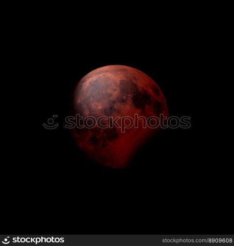 Red moon during partial eclipse. Red moon during a partial lunar eclipse