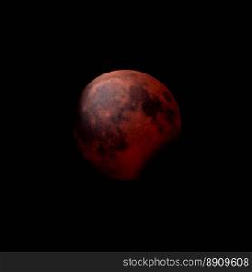 Red moon during partial eclipse. Red moon during a partial lunar eclipse