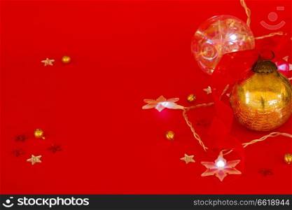 red new year background with  stars light and golden ball